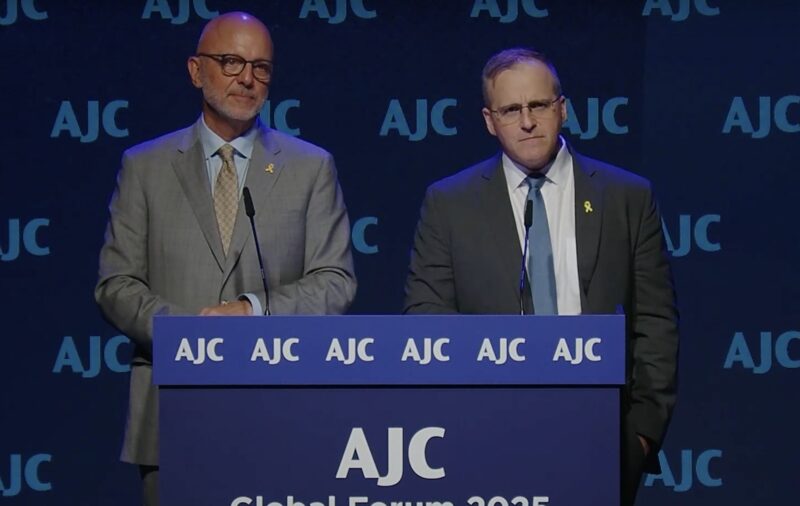 American Jewish Commitee CEO Ted Deutch (left) and USC Shoah Foundation CEO Robert Williams announce a partnership at the AJC Global Forum in New York City on April 27, 2025.
