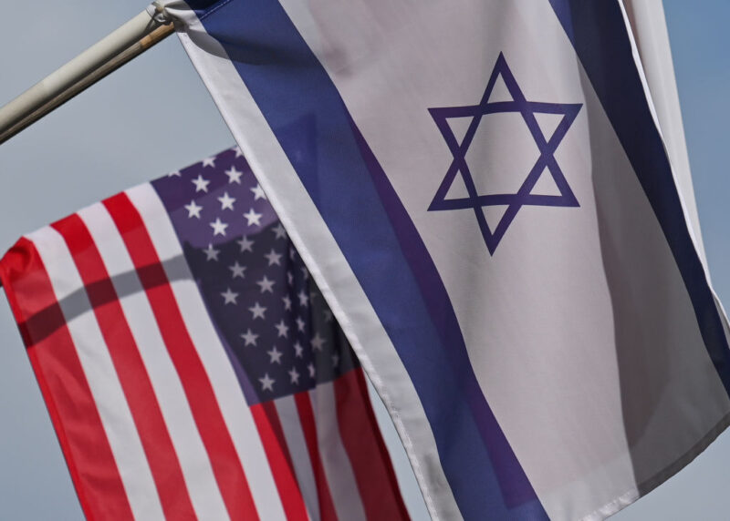 Israeli and U.S. flags are seen in Krakow, Poland, on Aug. 28, 2022.